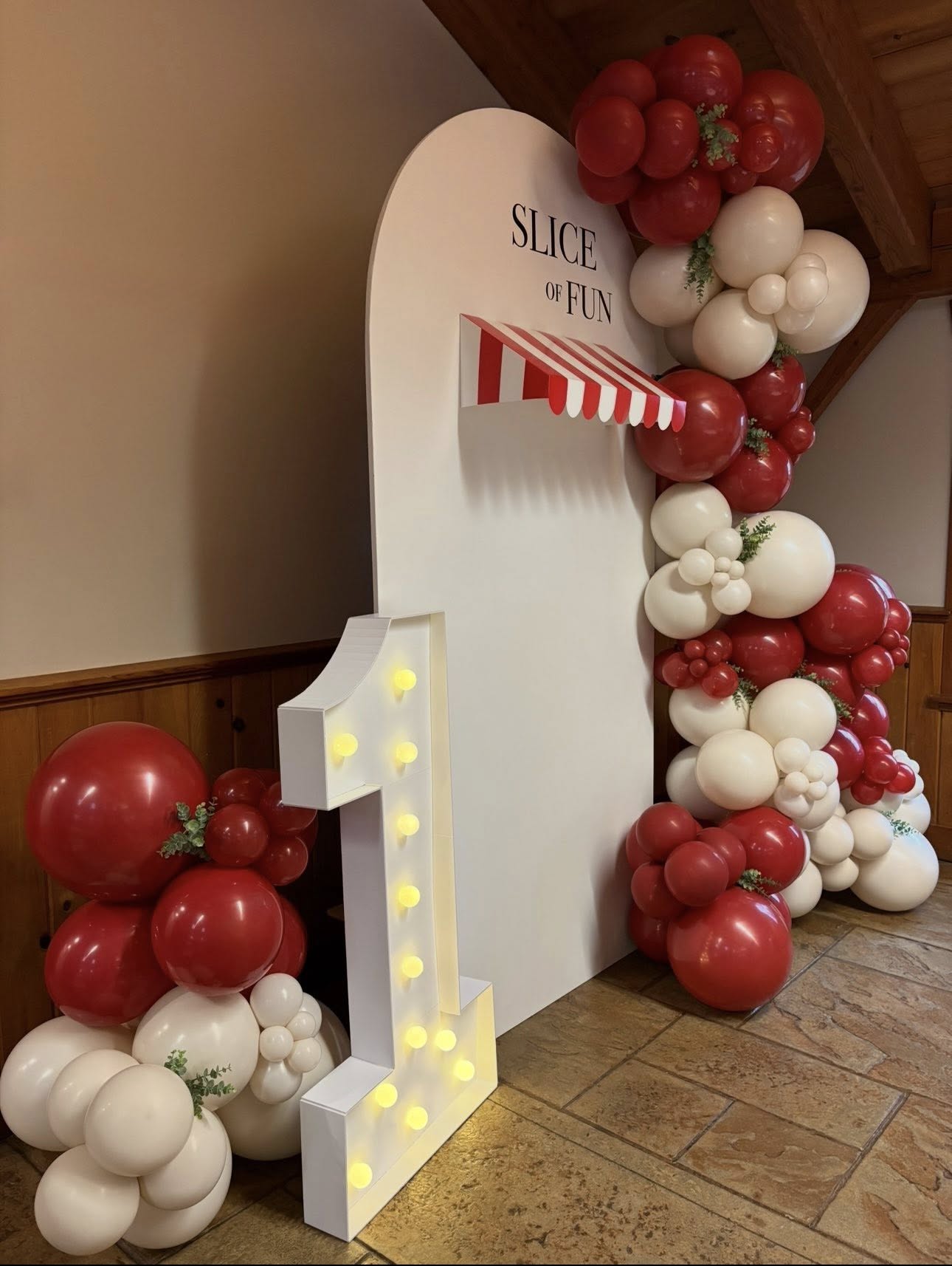 Slice of Fun pizza birthday arch